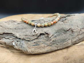 Unakiet kralen armband met echt zilveren bedel hartje